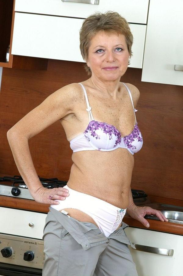 16P Granny gets undressed in kitchen