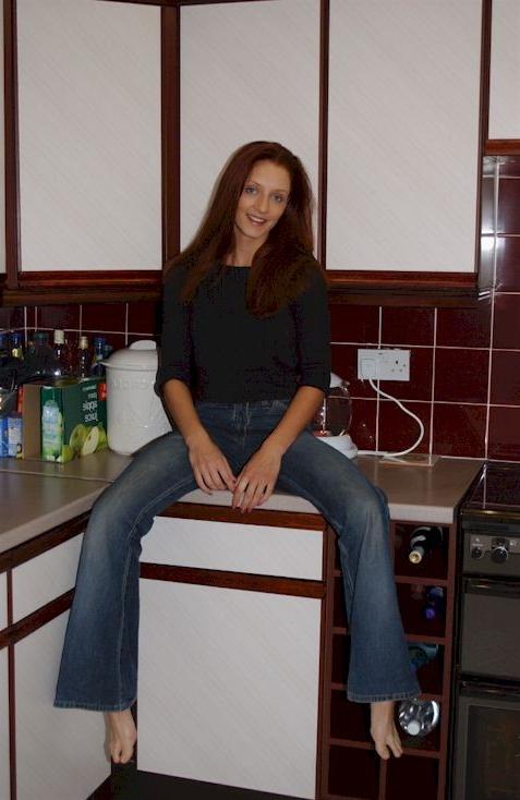 15P Sexy wife stripping in the kitchen
