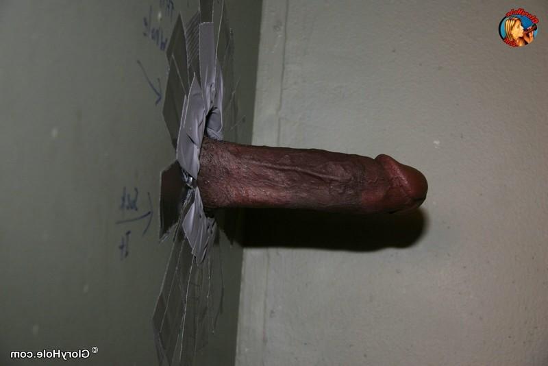 16P Bailey Brooks sucks a big black cock through a gloryhole