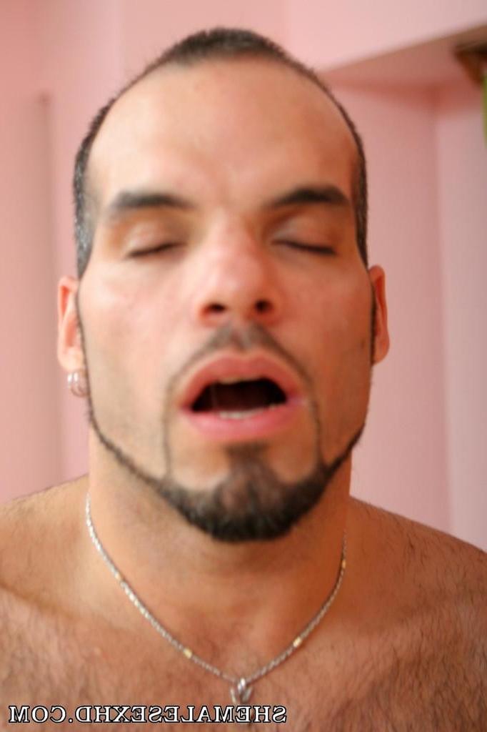 20P Gorgeous shemale goes down on this stud to eat some dick