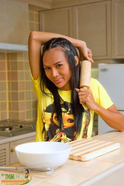 16P Ladyboy getting dirty in the kitchen