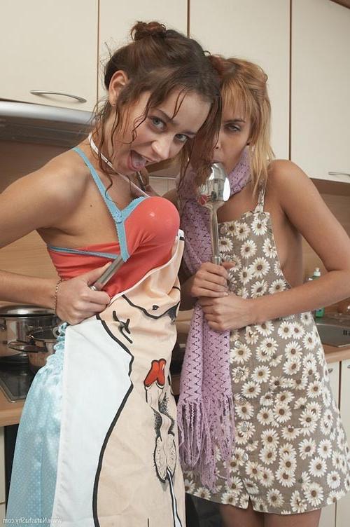 17P Two exciting young lezzies have some naughty fun in the kitchen