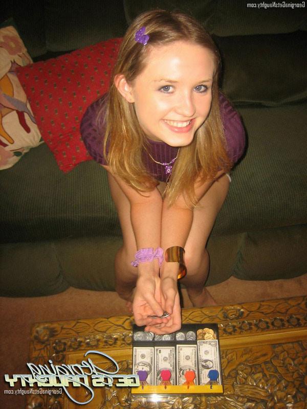 15P Georgina Naughty masturbates on sofa