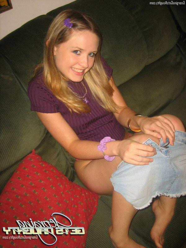 15P Georgina Naughty masturbates on sofa