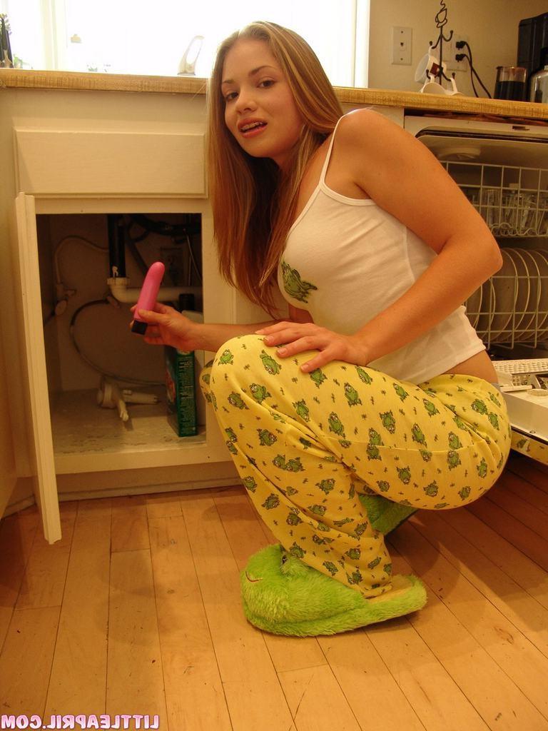 15P Eighteen year old strips to toy pussy in kitchen