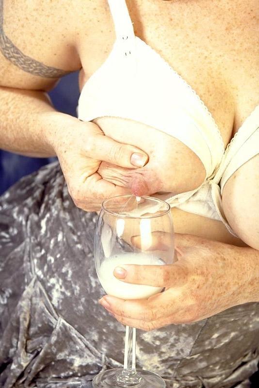 16P Lactating redhead milking tits