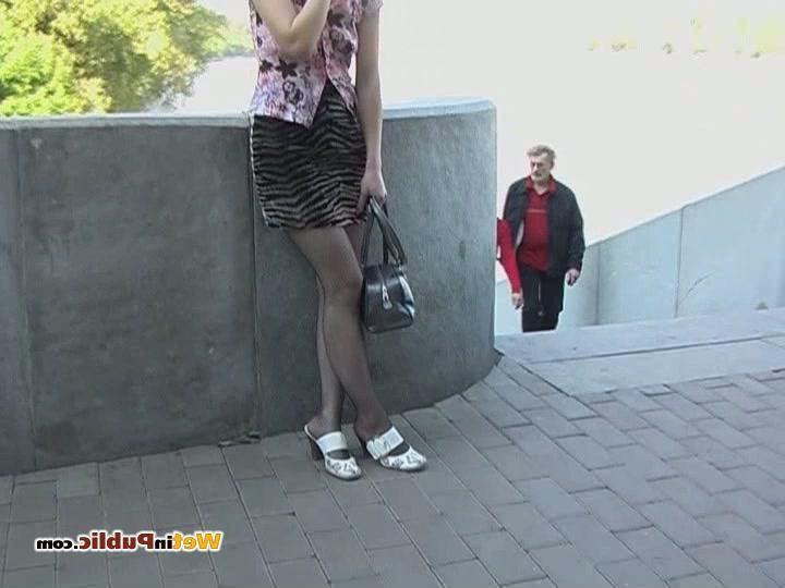 12P Foxy pissed her black fishnet pantyhose and striped mini in the street