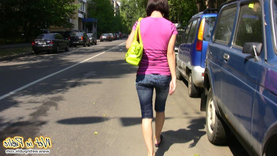 12P Hot chick has to change on the street after wetting her jeans breeches