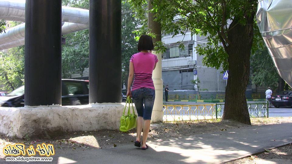 12P Hot chick has to change on the street after wetting her jeans breeches