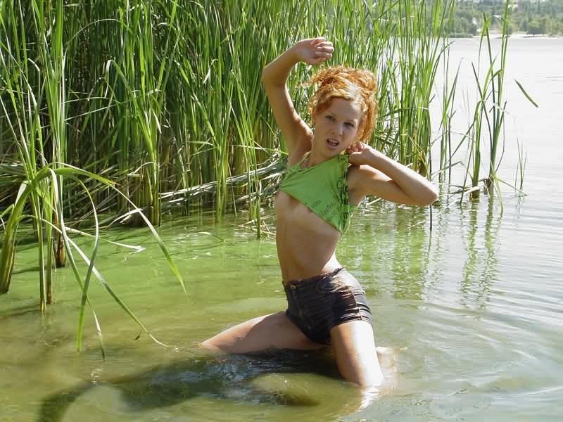 16P Slim and sassy redhead bares all her tan lines at the lake