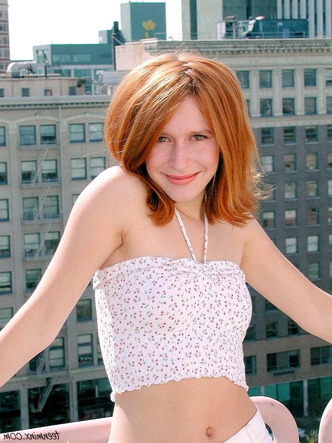 18P Petite redhead teen with a fire crotch strips nude on city roof