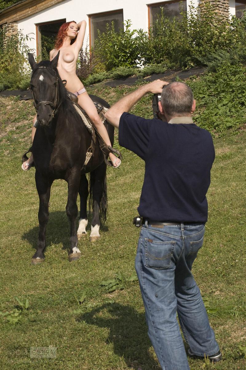 16P Redhead riding a horse