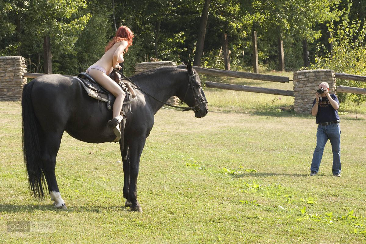 16P Redhead riding a horse