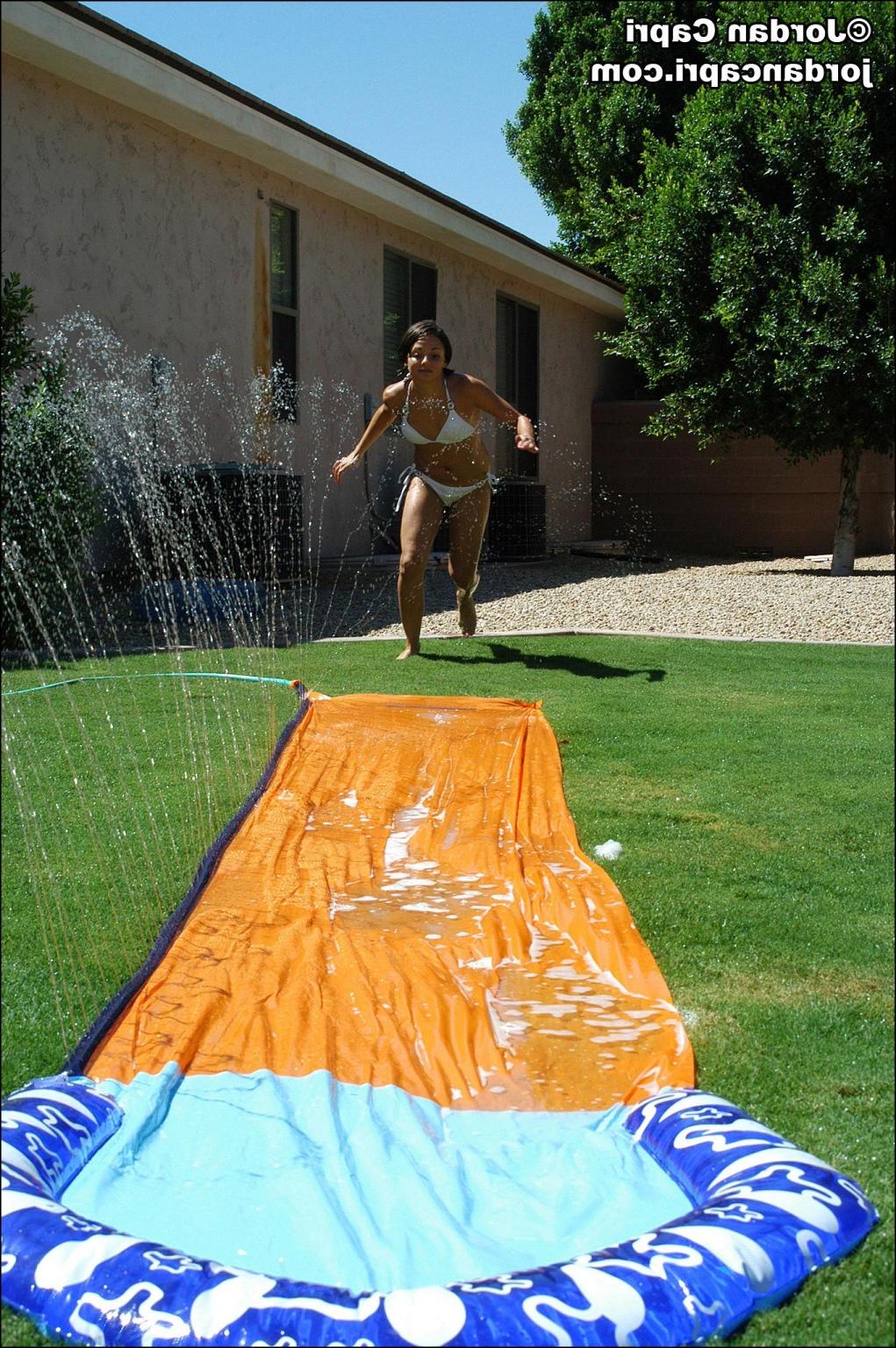 15P Jordan Capri gets wet and wild on a slip and slide