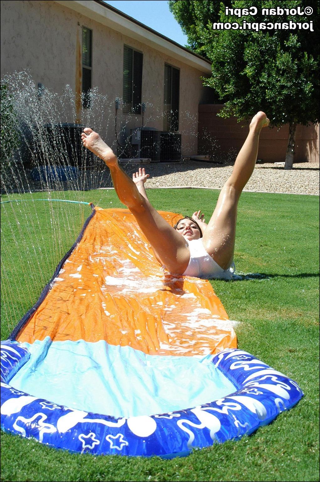 15P Jordan Capri gets wet and wild on a slip and slide