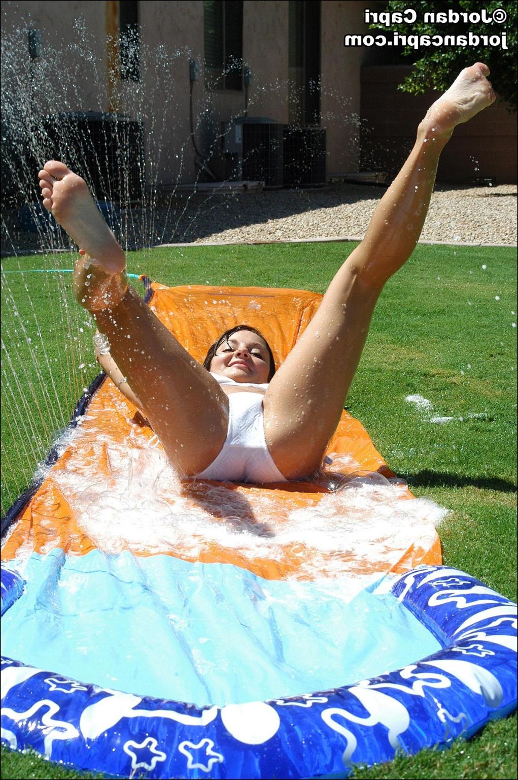 15P Jordan Capri gets wet and wild on a slip and slide
