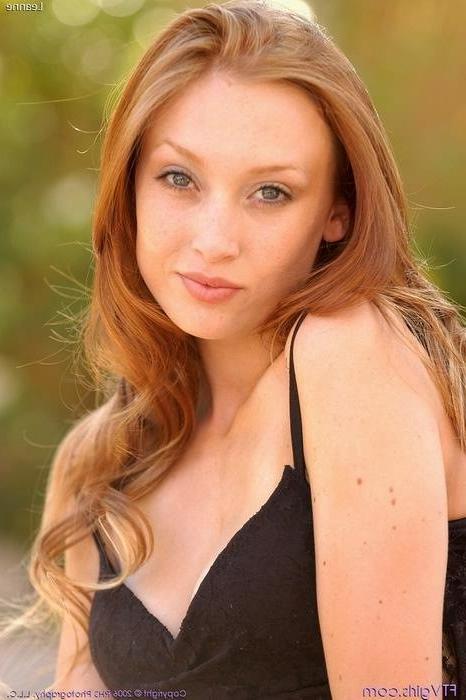 16P Sexy Redhead Posing Outdoors