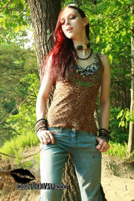 18P Redhead goth chick liz vicious strips in the woods