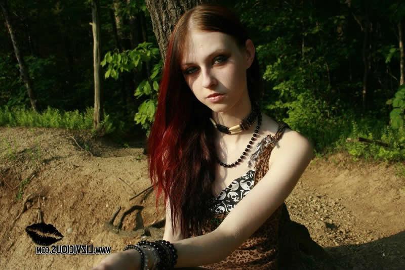 18P Redhead goth chick liz vicious strips in the woods