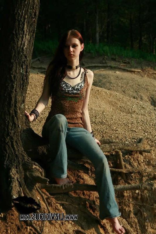 18P Redhead goth chick liz vicious strips in the woods