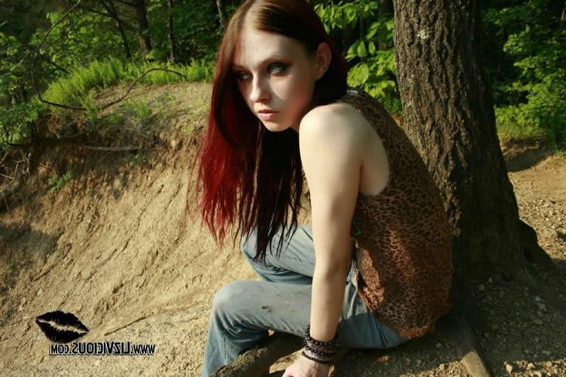 18P Redhead goth chick liz vicious strips in the woods