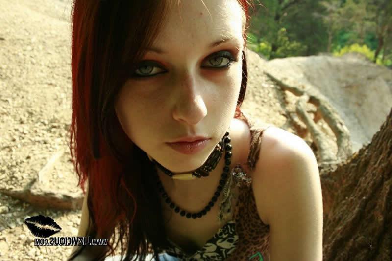 18P Redhead goth chick liz vicious strips in the woods
