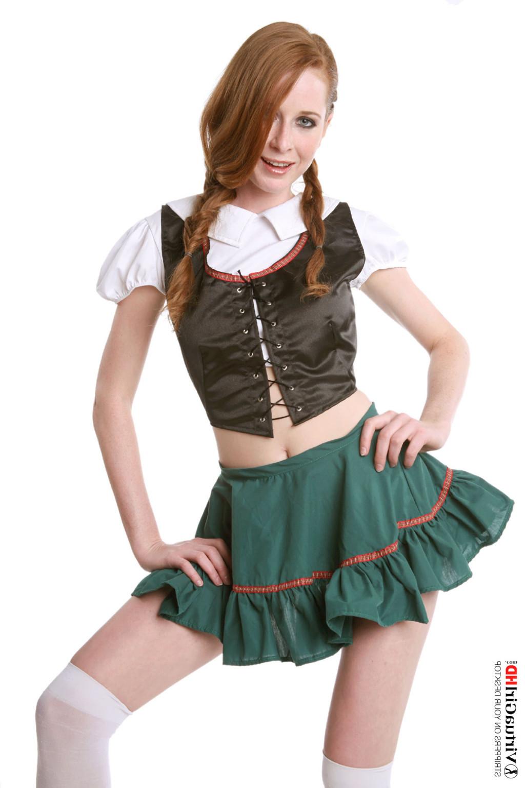 15P Cute redhead teen takes off her sexy schoolgirl outfit
