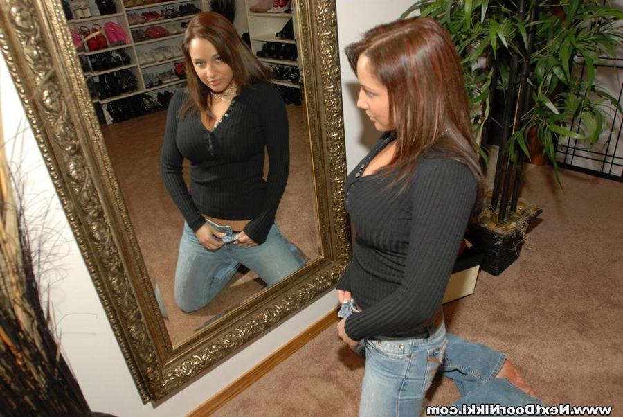 15P Busty Nikki showing off her ass in black lace panties