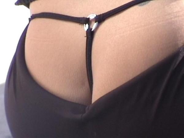 16P Tiny black thongs showing in public