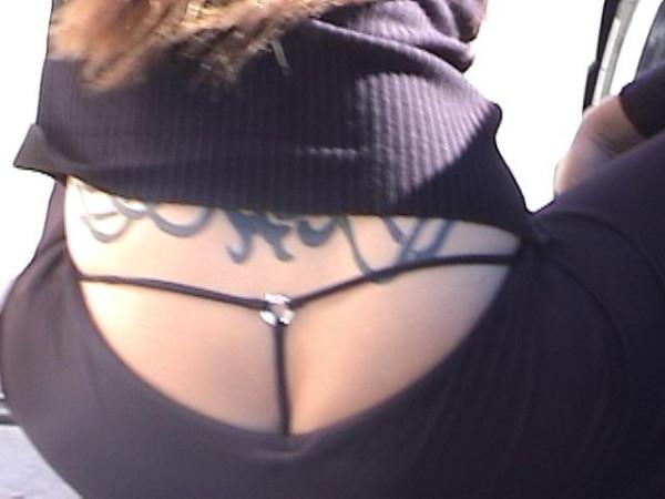 16P Tiny black thongs showing in public