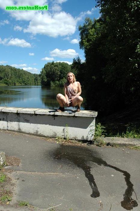 16P Nasty teen doing water sports in the public park