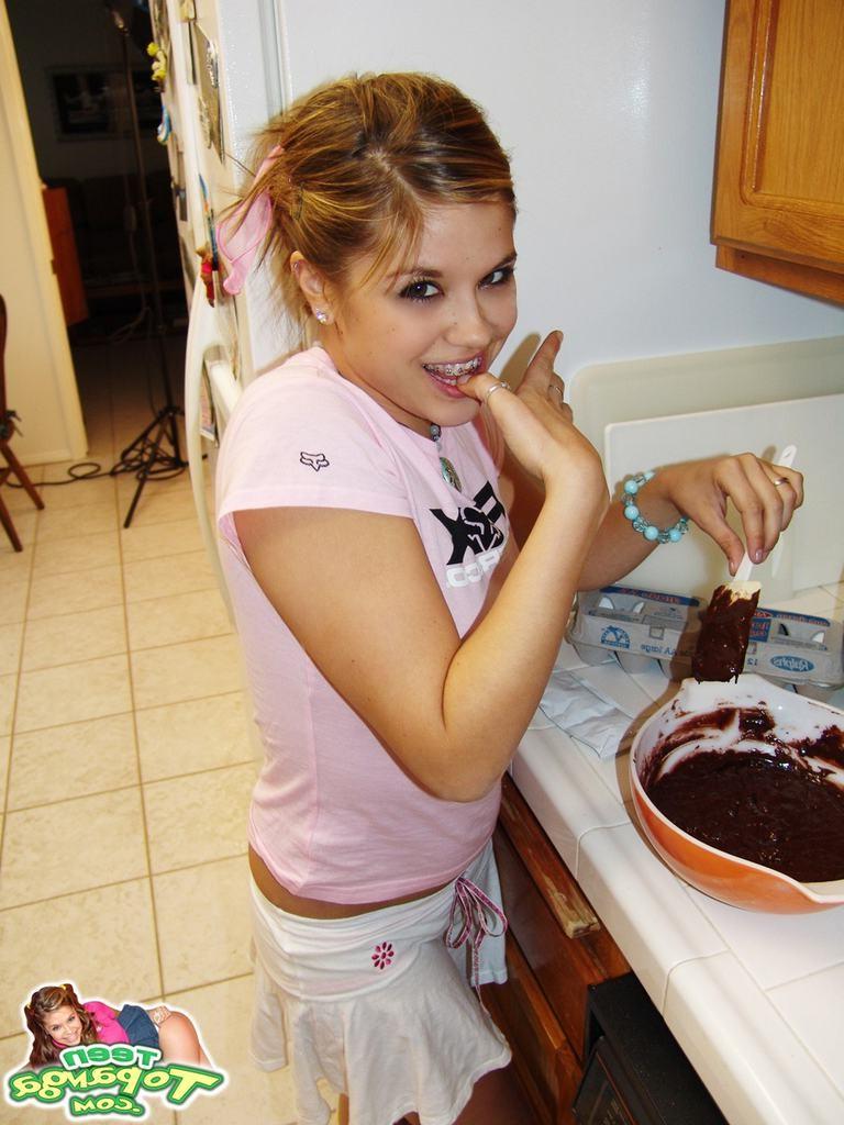 15P Eighteen year old bakes cake and strips in kitchen