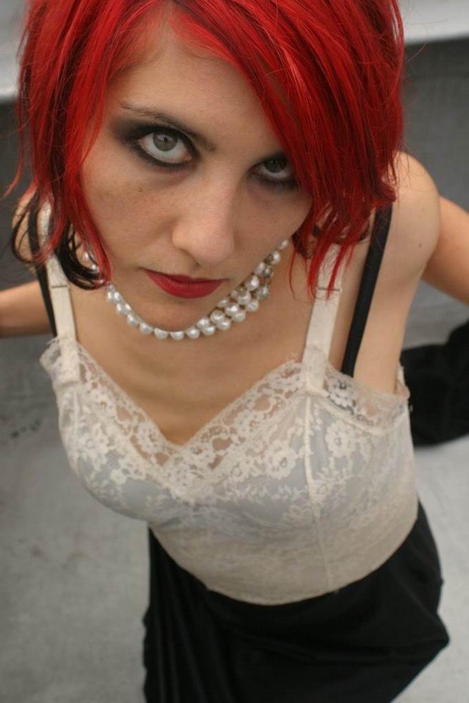 15P Gothic redhead teen posing