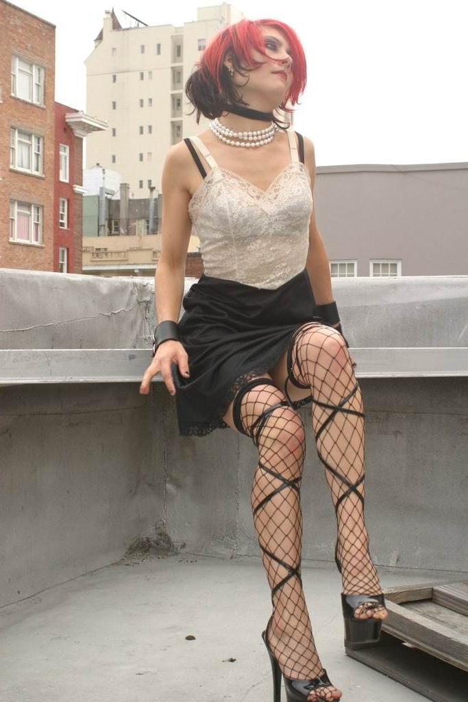 15P Gothic redhead teen posing