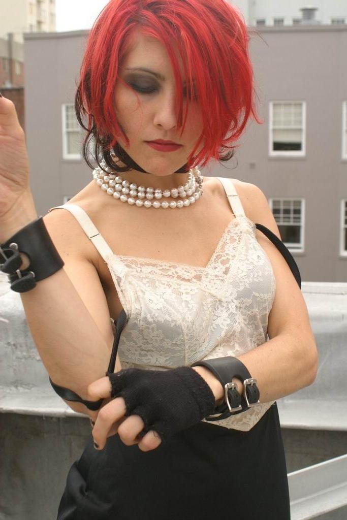 15P Gothic redhead teen posing