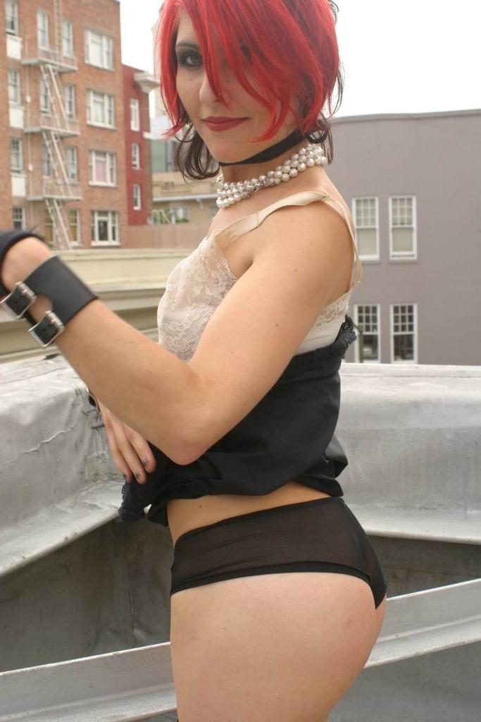 15P Gothic redhead teen posing