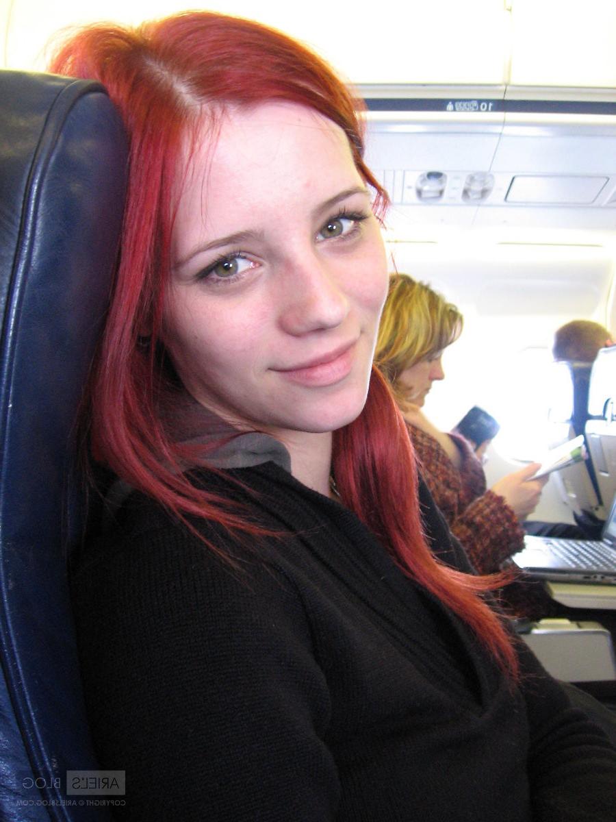 16P Candid pics of busty redhead model