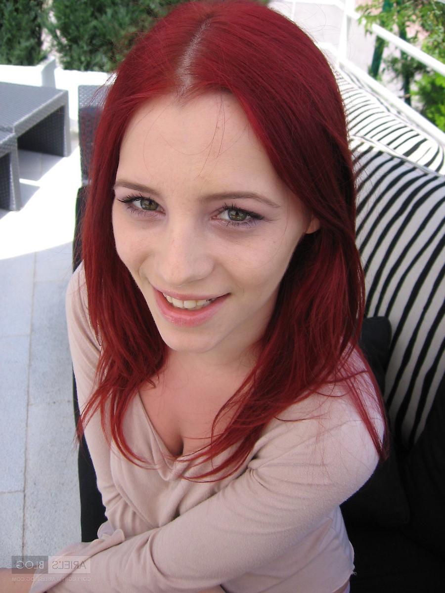 16P Candid pics of busty redhead model