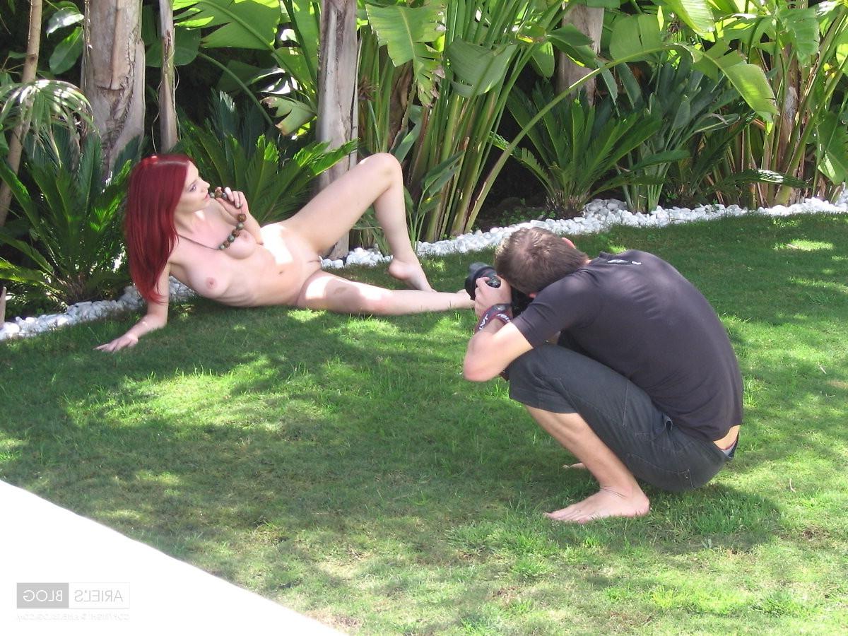 16P Candid pics of busty redhead model