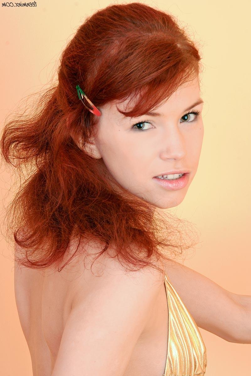 18P Redhead teen in a sexy bikini plays with oil and hot candle wax