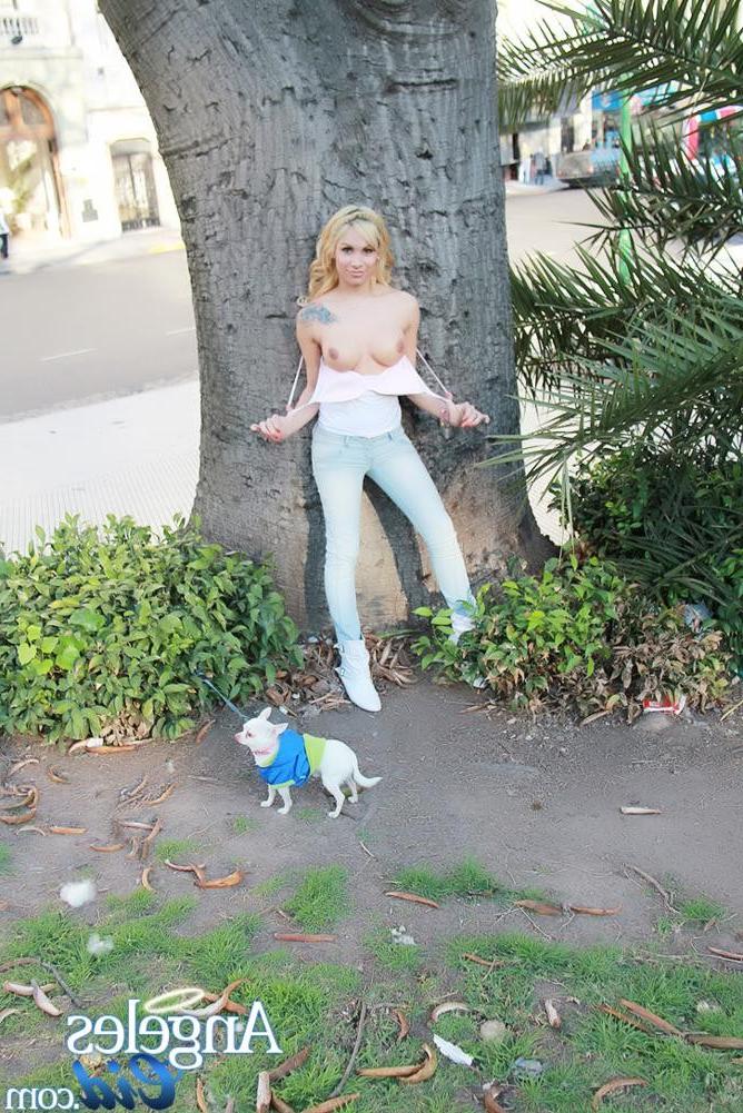 12P Gorgeous shemale posing outdoors and exposing her tits in public and shows us wh