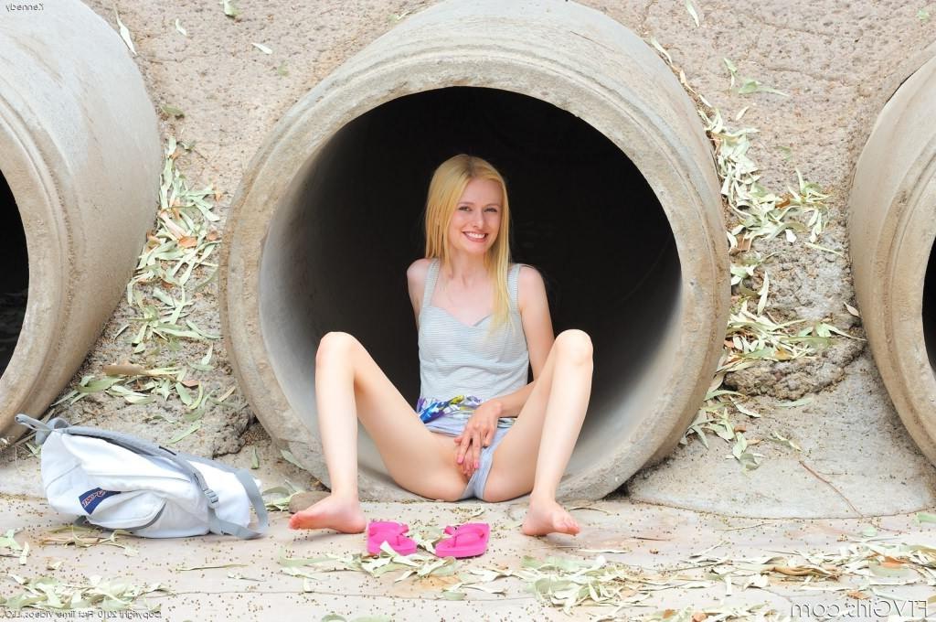 16P Slim blonde babe with hot ferm ass fingering her pussy in public
