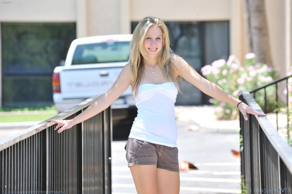 16P Blonde babe showing her tits and toying pink pussy in public