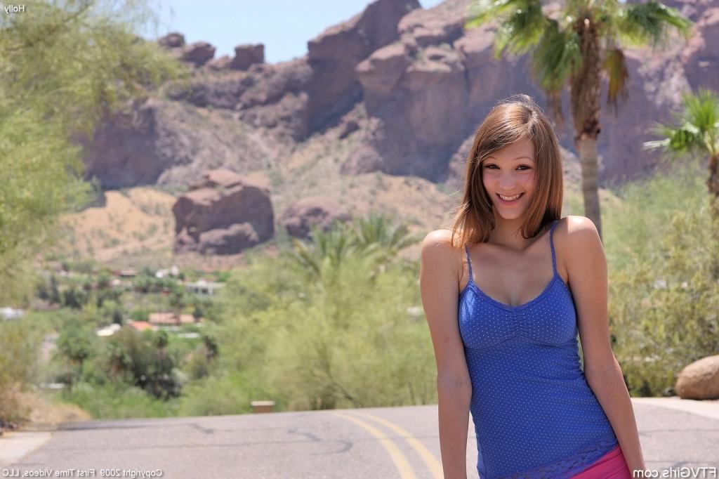 16P Cute redhead teen rubbing her tits and fingering pussy in public