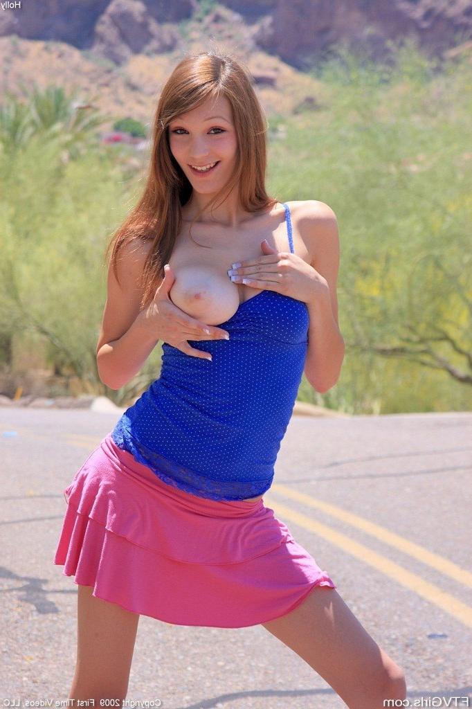 16P Cute redhead teen rubbing her tits and fingering pussy in public