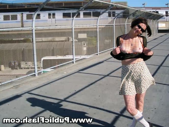 16P Hairy Flasher Lifts Her Skirt at a Public Stadium