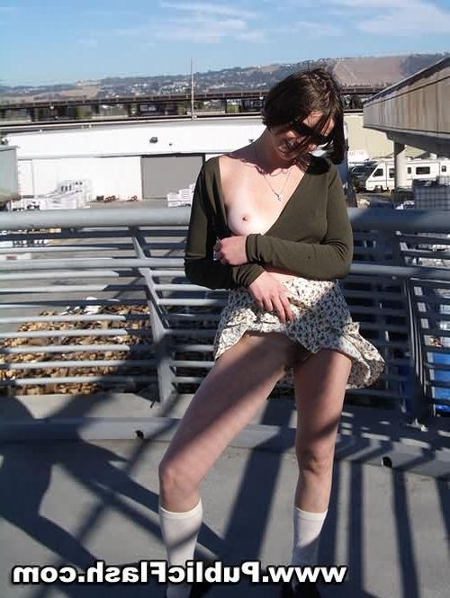 16P Hairy Flasher Lifts Her Skirt at a Public Stadium