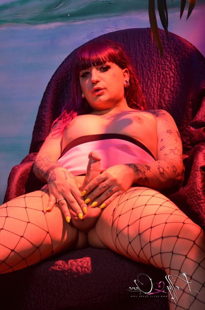 12P Redhead transsexual in fishnets