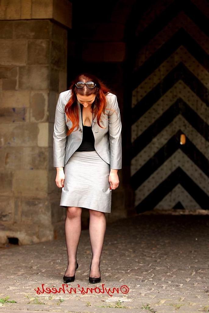 12P Redhead Lady Justine in nylons smoking outdoors