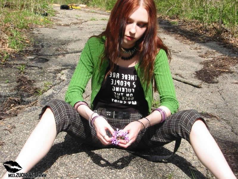 18P Redheaded goth chick strips in the woods
